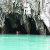 The Puerto-Princesa Subterranean River National Park site in the Philippines was inscribed on the World Heritage List in 1999. The site's topography varies from flat plains to rolling hinterlands and hills to mountain peaks, encompassing a complete mountai