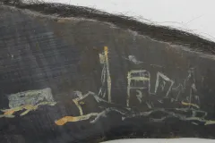a painting of a ship on a plate of baleen