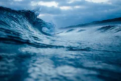 Waves breaking on the shore