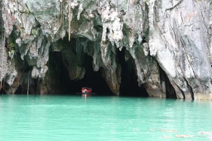 The Puerto-Princesa Subterranean River National Park site in the Philippines was inscribed on the World Heritage List in 1999. The site's topography varies from flat plains to rolling hinterlands and hills to mountain peaks, encompassing a complete mountai