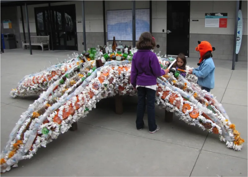 A life-size sea star sculpture made from plastic trash. 